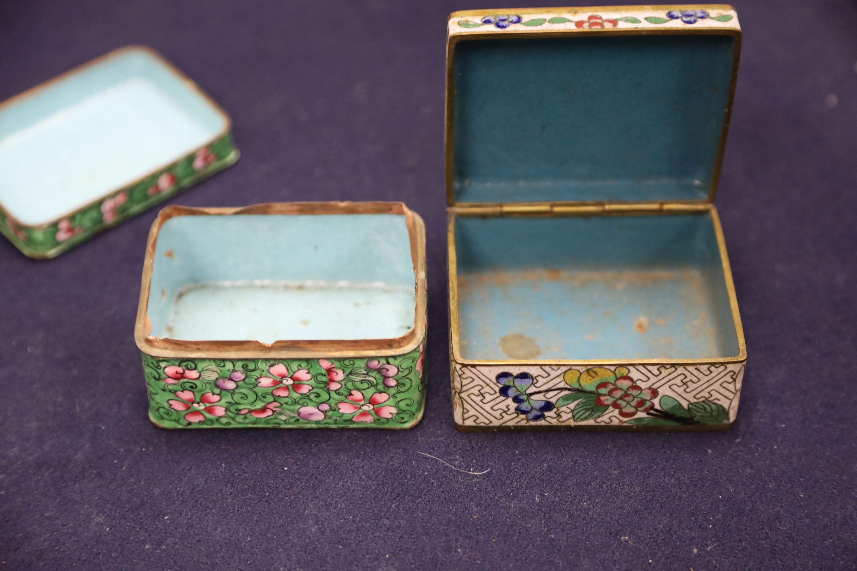 A Chinese small celadon jadeite lion on stand, a small jade circular plaque on stand (damage) and sundry items